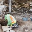 Archäologinnen machen überraschenden Fund während Sanierungsarbeiten bei der Kirche in Flims.